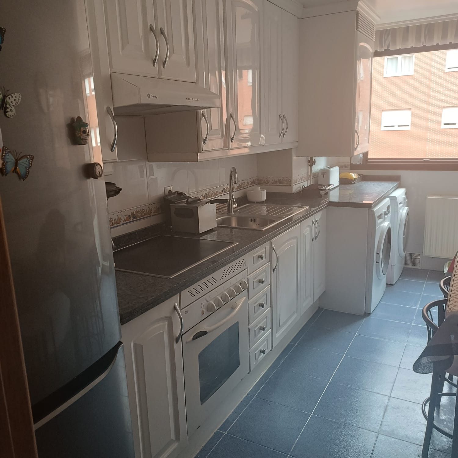 Cocina y lavadero antes de la reforma